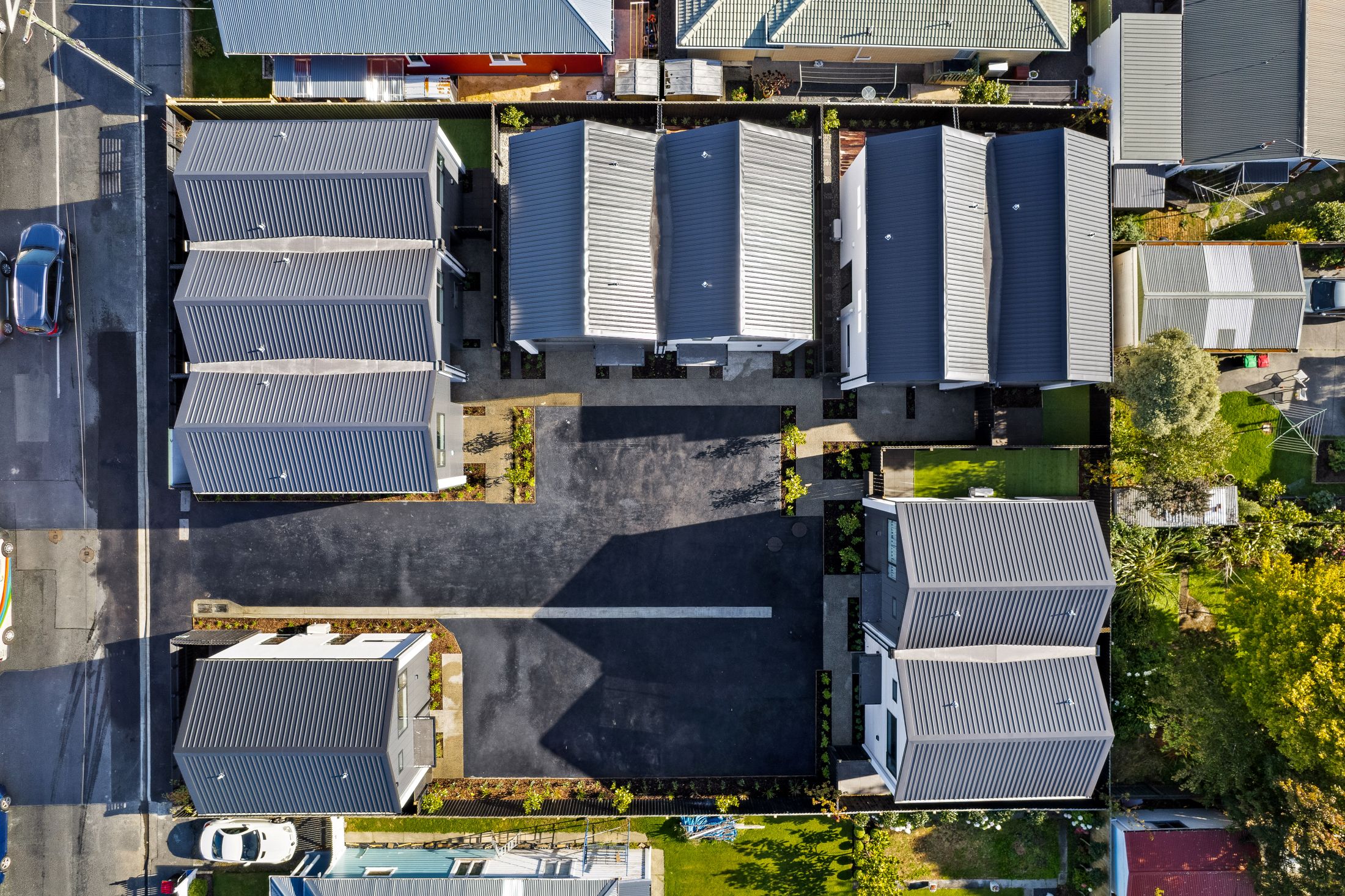 10-unit-townhouse-development-dunedin-metal-roof-parking-driveway