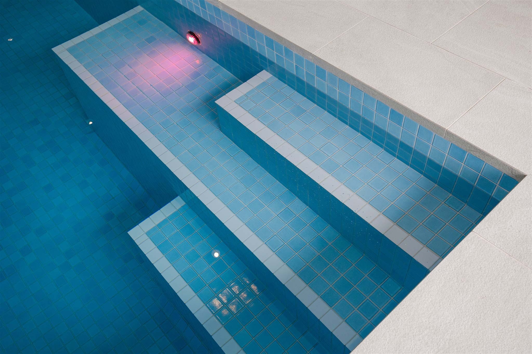 Tiled-indoor-heated-pool-stair-steps-Katipo-design