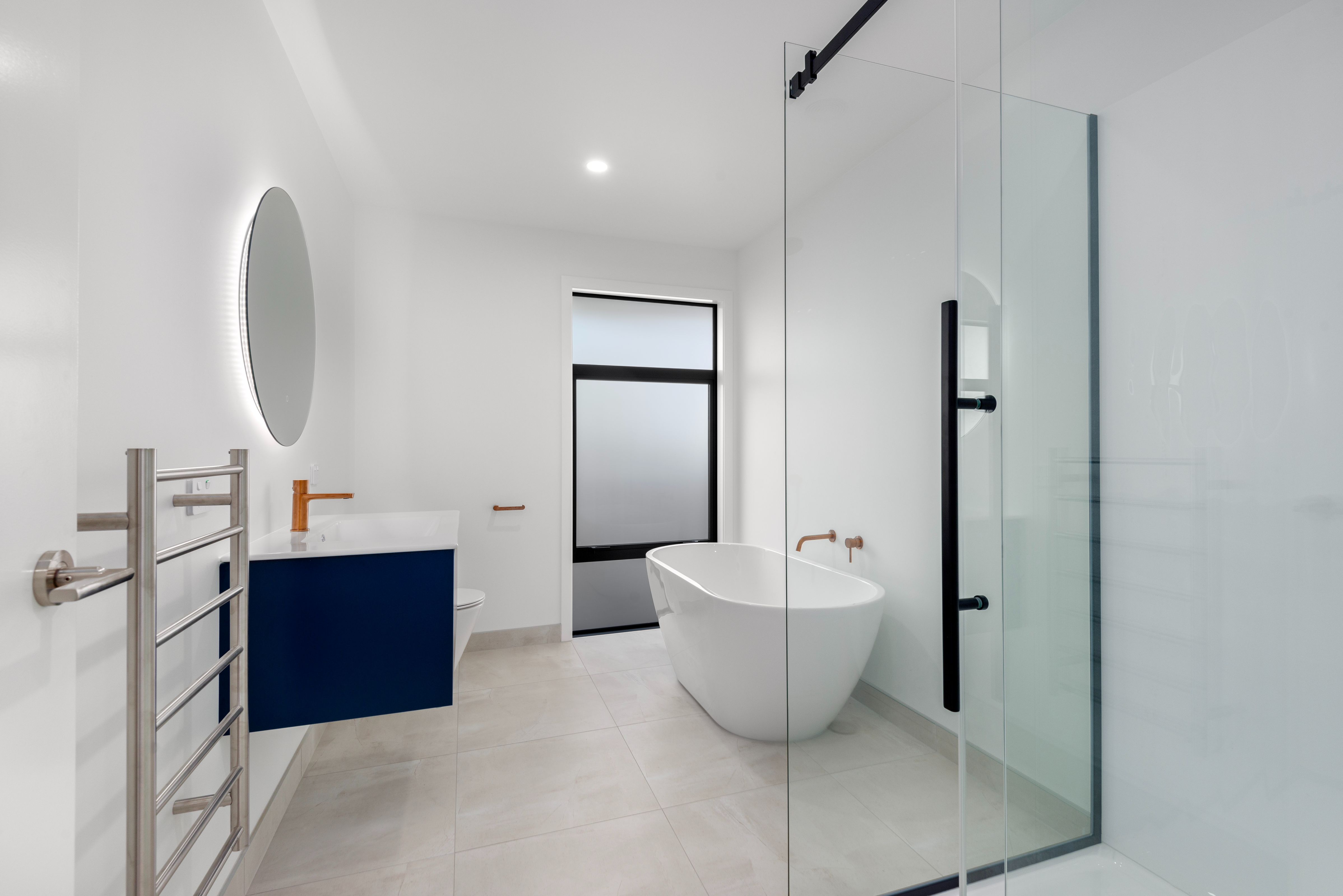 bathroom-ensuite-shower-free-standing-bath-vanity-toilet-heated-tile-floor