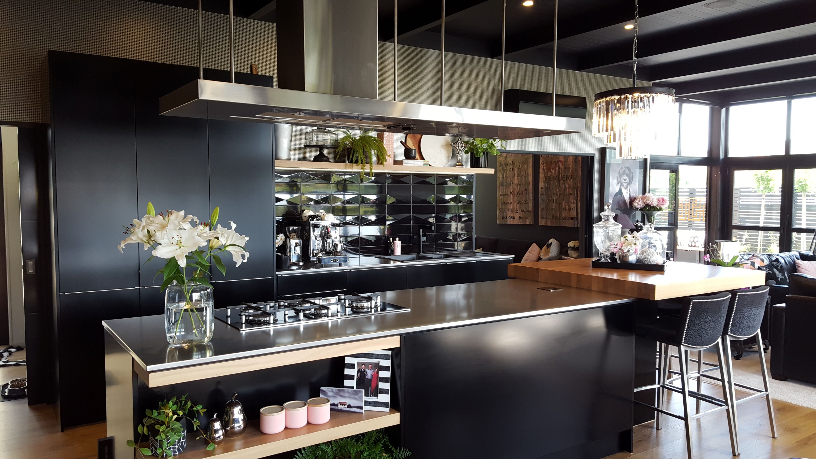 black-kitchen-custom-rangehood-stainless-steel-timber-island-bench