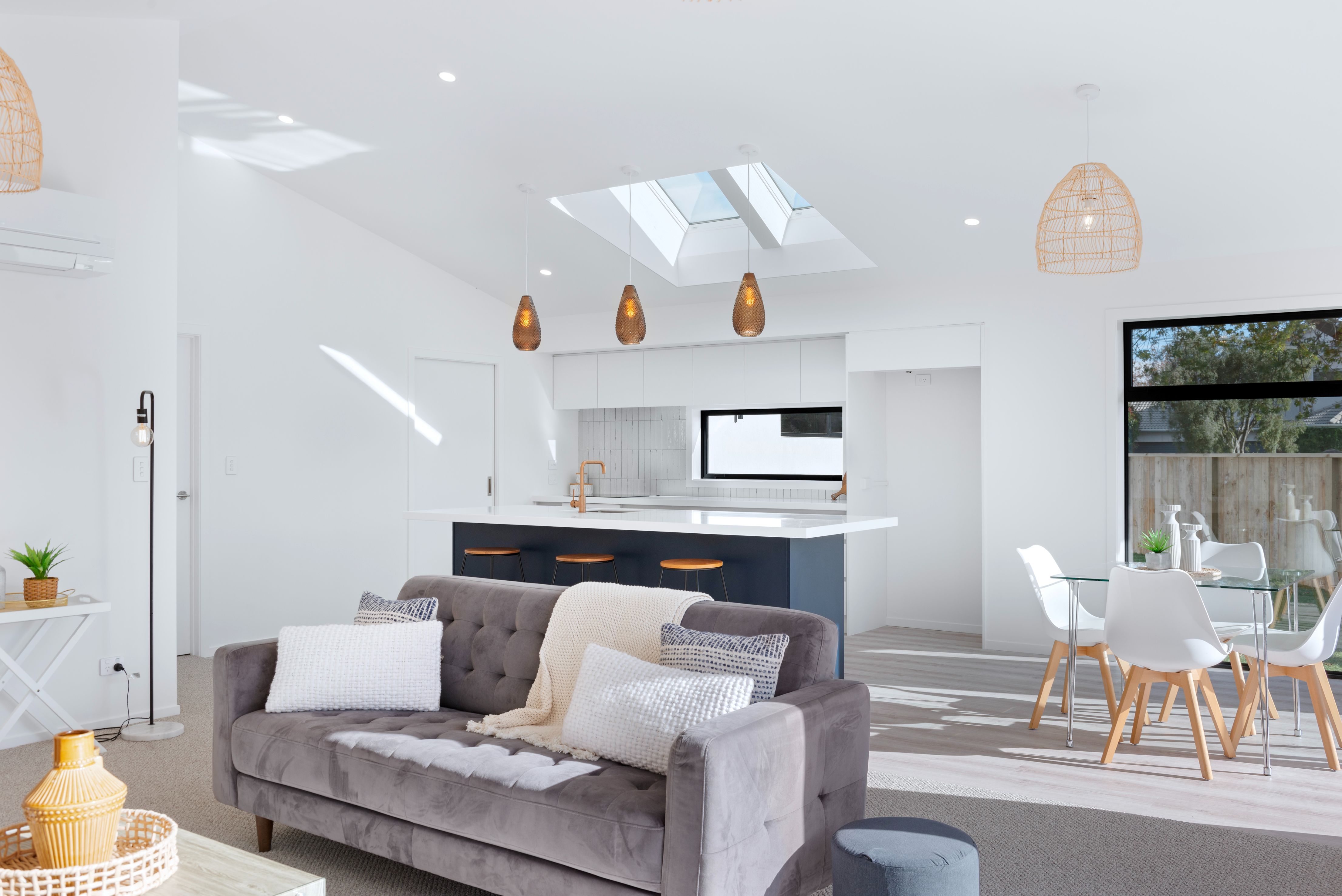 kitchen-dining-living-island-bench-skylights-pendant-light-neutral-colours