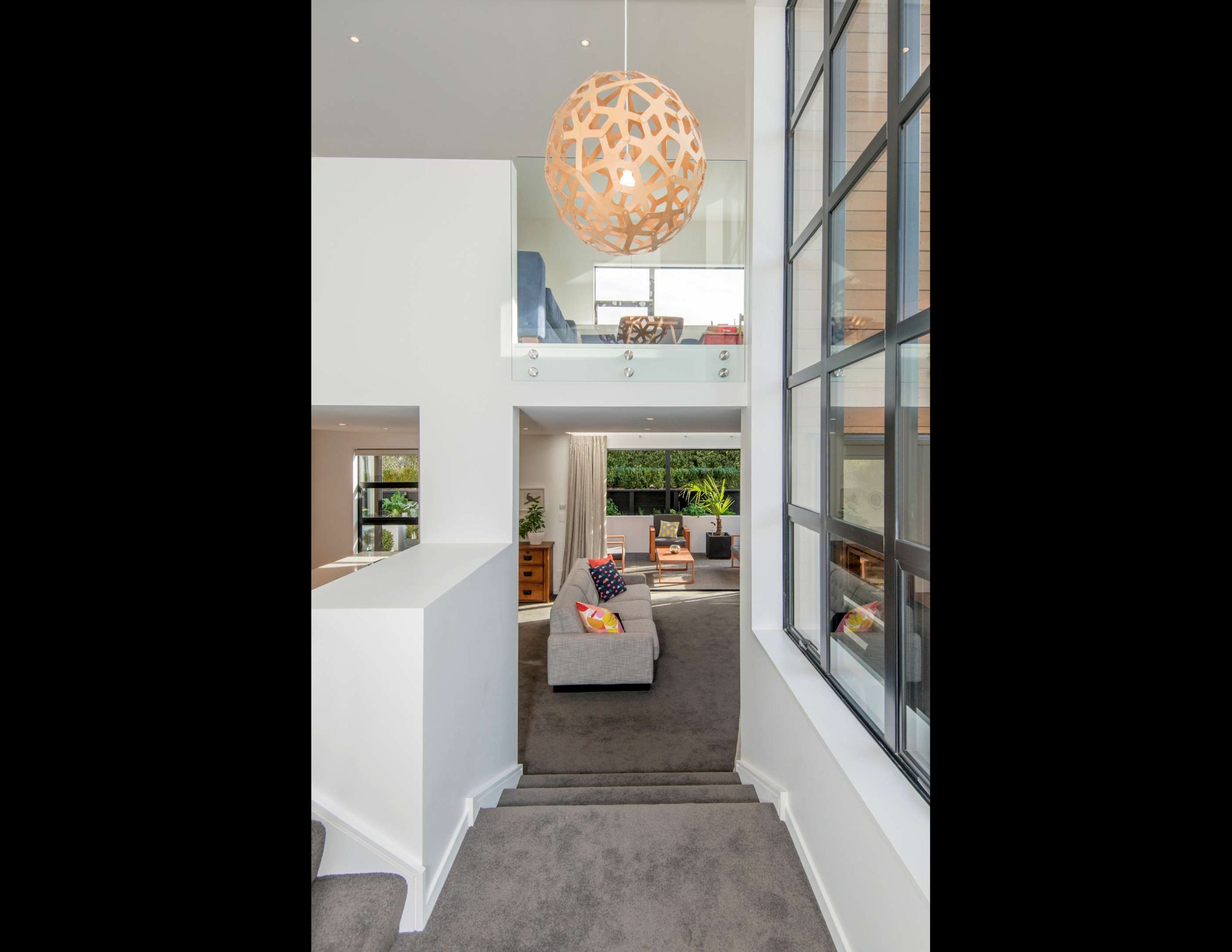 stairs-split-level-floor-david-trubridge-light-pendant-double-height