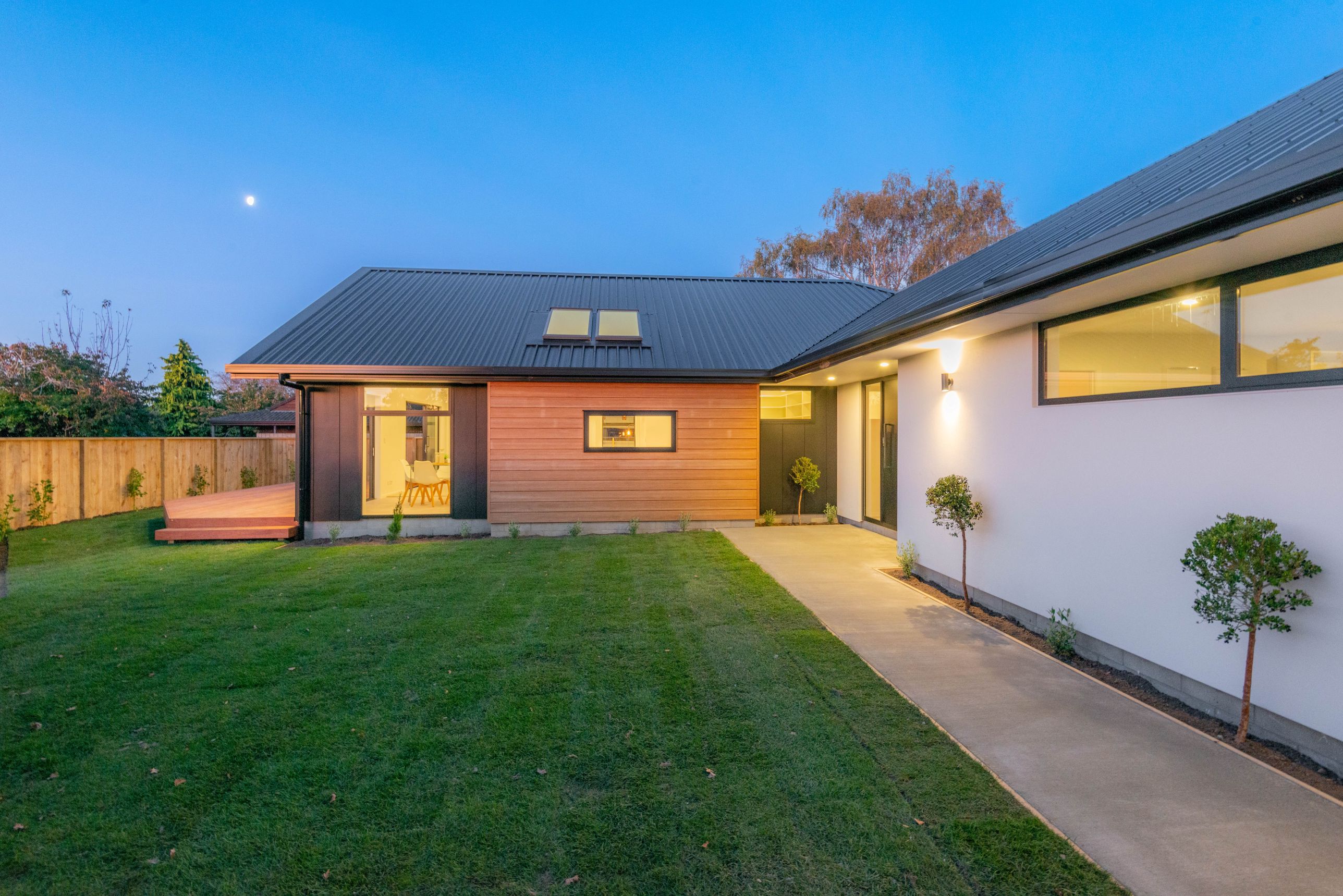 stria-cedar-sto-render-external-cladding-kwila-deck-entry-door-landscaping-path-grass